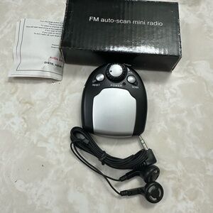 Avon Black and Silver FM Radio with Earphones( only for collectible)